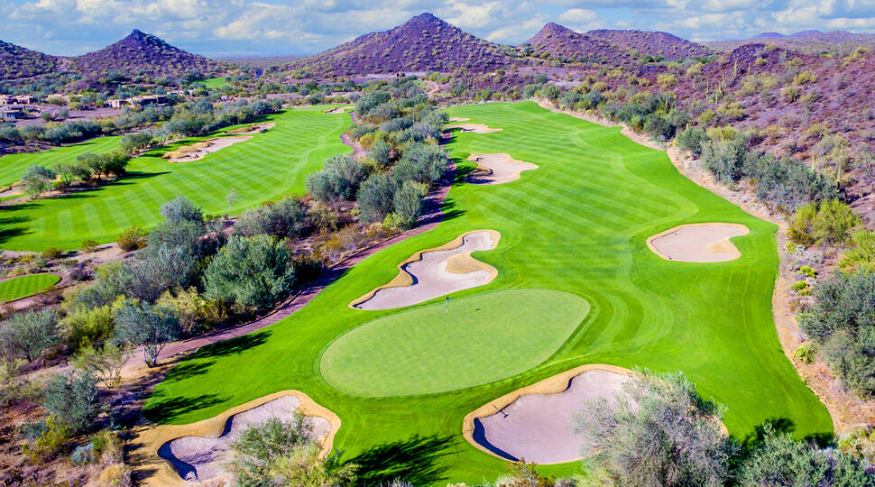 Quintero Golf Course in Arizona surrounded by desert mountains